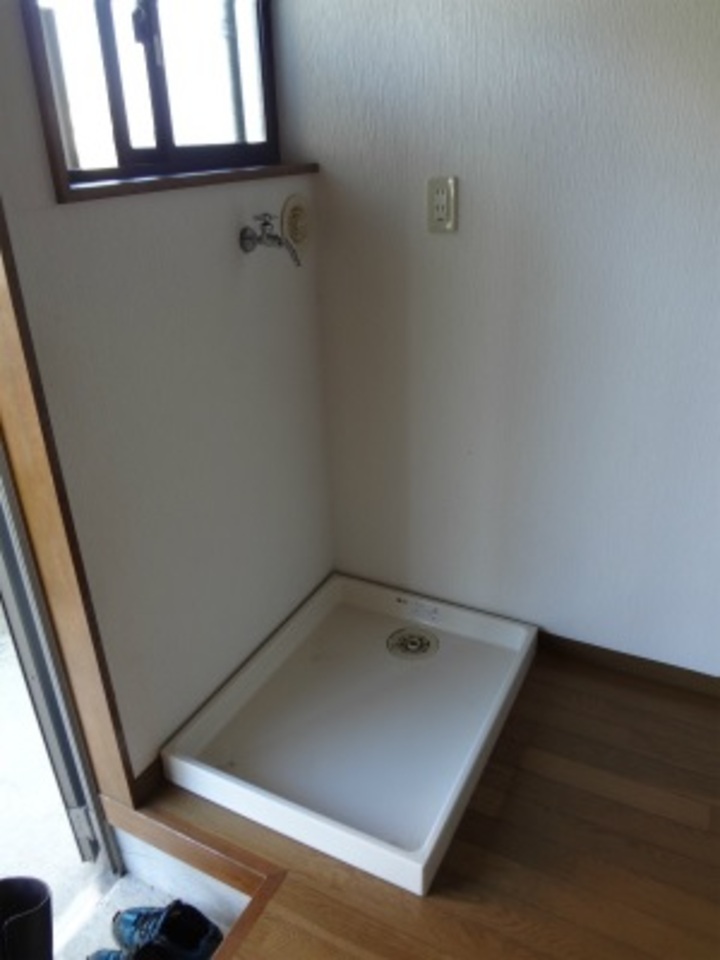 洗濯機はこちらに置いてね